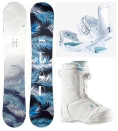 the snowboard is white and blue with palm leaves on it's bottom half