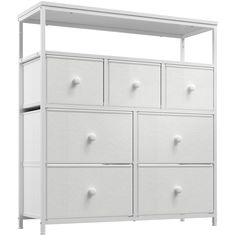 an image of a white dresser with drawers