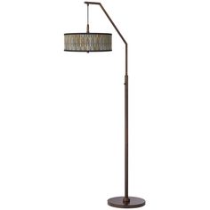 a floor lamp with a shade on the base and a drum light hanging from it's side