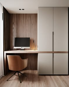 a room with a desk, chair and television on the wall next to wooden paneling