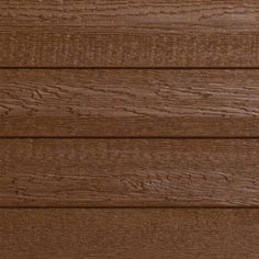 a close up view of the wood grains on a house's exterior wall