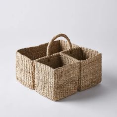 two woven baskets sitting on top of each other