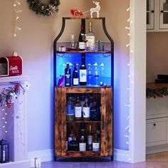 a wine rack with bottles and glasses on it