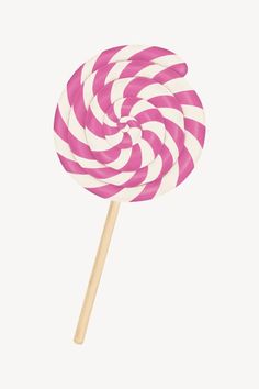 a pink and white striped lollipop on a stick