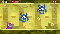 an animated game with blue crabs hanging from strings in front of trees and other plants