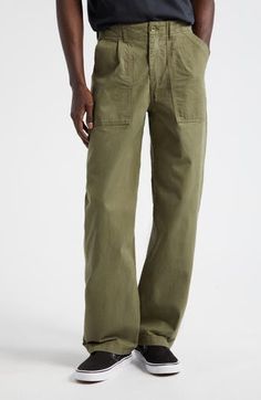 Inspired by military fatigues, these straight-leg pants made from sturdy Japanese twill are designed with dual pleats for a more polished look. 31" inseam; 17" leg opening; 11 1/2" front rise; 16 1/2" back rise (size 30) Zip fly with button closure Front slant pockets; back button-flap patch pockets 100% cotton Machine wash, line dry Made in Portugal Designer Clothing Affordable Men's Khaki Pants, Wide Leg Mens Pants, Mens Straight Leg Pants, Cool Mens Pants, Mens Work Clothes, Ava Outfit, Utility Pants Outfit, Green Chinos Men, Utility Pants Men