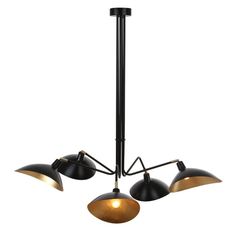 three light chandelier in black and gold with four shades on each lamp shade