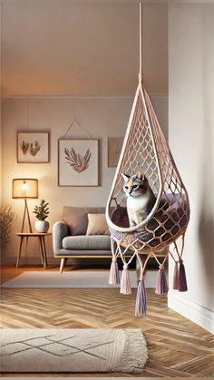 a cat is sitting in a hammock chair