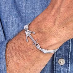 This classic nautical symbol is given a modern twist with our Men's Personalized Anchor Bracelet. Perfect for sea-lovers, the anchor charm will be hand engraved with your names or dates and attached to your choice of colorful braids.925 Sterling SilverAnchor Charm: 1.1x0.9Choose from a wide range of braid colorsSize: between 8-9, fully adjustable sliding knot fasteningHand-engraved in our Paris workshopSent with love in a complimentary gift boxAny slight variations in lettering depth, spacing and alignment from the examples shown are part of the aesthetic and originality of the piece Colorful Braids, Crystal Dice, Anchor Bracelet Men, Anchor Charm, Personalized Fathers Day Gifts, Anchor Bracelet, The Anchor, Grandmother Gifts, Unique Personalized Gift