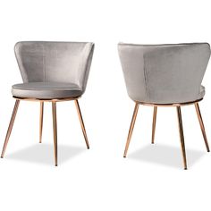 pair of grey velvet chairs with gold legs