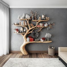 a living room with bookshelves and a tree on the wall in front of it