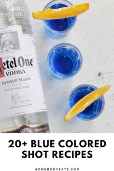 blue colored shot recipe with orange slices and vodka