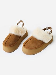 DESCRIPTION:Retro-inspired chunky slipper.FEATURES:SlipperRound ToeElastic Heel StrapSheepskin Collar10mm Sheepskin Lining & InsoleUpper: Suede | Outsole: EVAHeel Height: 2 in. Saint Bernard, Slipper Shoes, Womens Uggs, Retro Inspired, Chestnut, Slippers, Women Shoes, Heels, Quick Saves