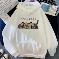 the avengers hoodie is on display next to other items