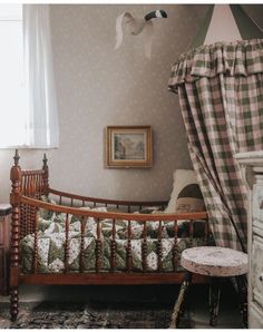 an old fashioned wooden bed in a bedroom