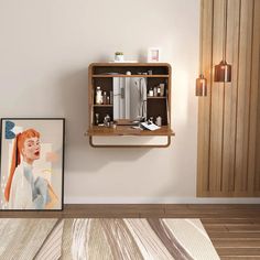 a wooden cabinet sitting on top of a hard wood floor next to a framed painting