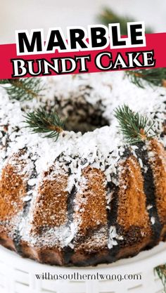 a marble bundt cake with powdered sugar and pine sprinkles on top