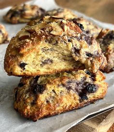 blueberry and almond scones are stacked on top of each other, ready to be eaten