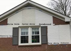 a white brick building with black shutters and writing on the front wall that says, white dove oyster white snowbound