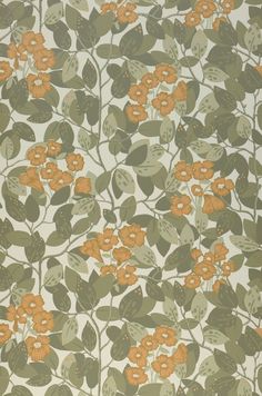 an orange and green wallpaper with leaves and flowers on it's side,