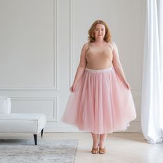 Indulge in the whimsical charm of our Pink Tulle Skirt for Women, a breathtaking piece that exudes grace and femininity. This Pink Tutu Skirt is a delightful fusion of elegance and playfulness, designed to make you feel like a modern-day princess. Crafted with meticulous attention to detail, this Adult Tutu Plus Size skirt is tailored to enhance your natural beauty and celebrate your curves. Available in sizes ranging from XS to XXL, as well as custom sizes, we believe that every body deserves t Tulle Skirt Women, Tutu En Tulle, Pink Tutu Skirt, Pink Tulle Skirt, Ballet Clothes, Tulle Midi Skirt, Tulle Tutu Skirt, Pink Tutu, Tulle Tutu