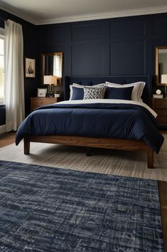 a bedroom with dark blue walls and wooden furniture