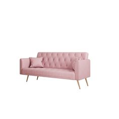 a pink couch with two pillows on top of it and some wood legs in front