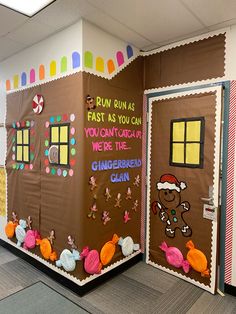 a classroom decorated for christmas with gingerbreads and candy canes on the door