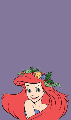 the little mermaid with her long red hair and green leaves on her head is smiling