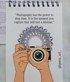 a hand holding up a camera with a quote on the front and back of it that reads photography has the power to stop time it is the moment you capture that will last a