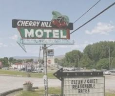 the cherry hill motel sign is on display