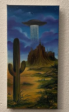 an acrylic painting of a desert scene with a large alien hovering over a cactus