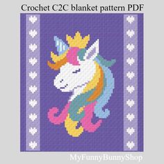 a cross stitch unicorn with a crown on it's head