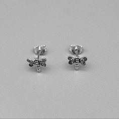 Sterling Silver Dragonfly Stud Earrings, Silver Earrings, Silver Dragonfly, Peaceful Dragon’s 925 Stamped Earring Height: 7mm Material: 925 Sterling Silver Lion Earrings, Pineapple Earrings, Stud Earrings Silver, Ghost Earrings, Halo Earrings, Dainty Studs, Tassel Drop Earrings, Link Earrings, Heart Dangle Earrings