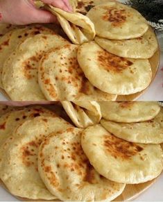 there is a plate full of flat breads on the table