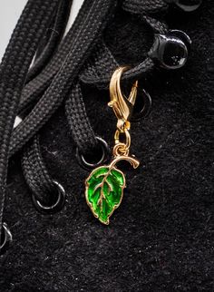 Gold Enameled Green Leaf Roller Skate Charm - Shoe Charm, Zipper Pull, Bag Charm Details: ♥ Gold toned Skate Charm ♥ Attach anything easily with a lobster claw clasp. Quick to change out if you are on the go! ♥ Measure approx 1.5" L x 0.25" w ♥ Mix and match colors! This listing is for 1 charm only. If you would like t Skate Vibes, Yoga Mat Strap, Match Colors, Roller Skate, Roller Skates, Shoe Clips, Roller Skating, Shoe Charms, Gold Enamel