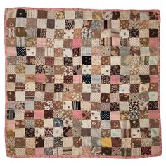 an old patchwork quilt is displayed on a white background