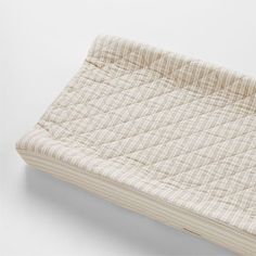 a close up of a mattress on a white surface with no sheets or covers in it