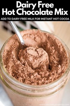 dairy free hot chocolate mix in a mason jar with text overlay reading dairy free hot chocolate mix add to dairy free milk for instant hot cocoa