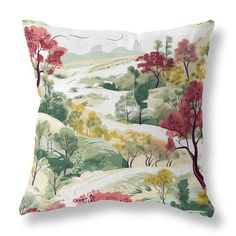 a decorative pillow with trees and hills printed on the front in green, red, yellow and white