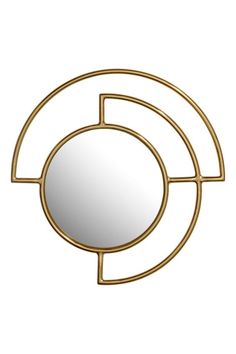 an art deco mirror with a circular frame and gold metal design on the front, against a white background