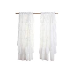 two white curtains hanging from a wooden rod