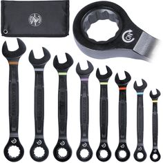 a set of wrenches and other tools are shown