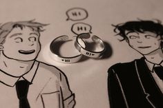 two rings sitting on top of each other next to an image of the same person