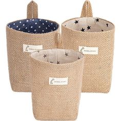 three baskets with stars and polka dots on the bottom, one has a blue dot in it