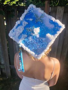 blue sky grad cap with clouds and beaded charm Blue Cap Graduation Decoration, Cinnamoroll Graduation Cap, Light Blue Graduation Cap Ideas, Graduation Cap Designs Blue And White, Royal Blue Grad Cap Ideas, Navy Blue Grad Cap Ideas, Cap Decoration Graduation Blue, Blue Graduation Cap Ideas