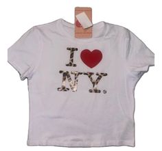 Description: Embrace the iconic style of the Y2K era with our I Love NYC Leopard Print Baby Tee! This playful and trendy shirt features a bold leopard print design paired with a classic "I Love NYC" graphic, perfect for little fashionistas who want to stand out. Key Features: Material: Soft, comfortable fabric that's gentle on your baby's skin. Design: Eye-catching leopard print with vibrant "I Love NYC" text. Fit: Relaxed fit for easy movement and all-day play. Style: A perfect blend of urban chic and playful fun! Ideal for outings in the city, family gatherings, or simply showing off your love for NYC, this baby tee is a must-have for stylish little ones. Pair it with jeans, shorts, or skirts for an effortlessly cool look! Care Instructions: Machine wash cold, inside out, and tumble dry I Heart Ny, Nyc Graphic, Nyc Shirt, Y2k Tshirt, I Love Nyc, Leopard Print Baby, Y2k Era, Skin Design, Baby Tees Y2k