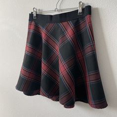 "y2k plaid mini skirt BDG red blue black mini skater type skirt. Light soft material. Back zipper. Great condition. measurements taken flat: 27\" waist 15.5\" length (approx) free shipping! ships in 3-4 days We are a sustainable, curated and custom shop called shop AKIND - bringing new trends to thrifted and vintage! We treat each order with care and are so appreciative for each one. Please don't hesitate to contact us with questions about sizing or other; we respond quickly and kindly. We currently don't accept returns/exchanges. We thank you for understanding!" Plaid Mini Skort For School, Plaid Mini Skirt For School In Winter, Winter School Plaid Mini Skirt, Y2k 90s Aesthetic, Mini Skater Skirt, Skirt Y2k, 90s Aesthetic, Aesthetic Clothing, Plaid Mini Skirt