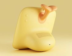 an electronic device with ear plugs attached to it's back end, on a yellow background