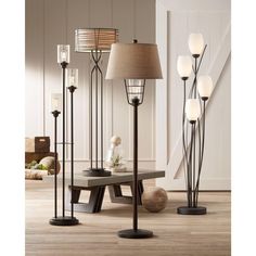 an assortment of floor lamps in a living room